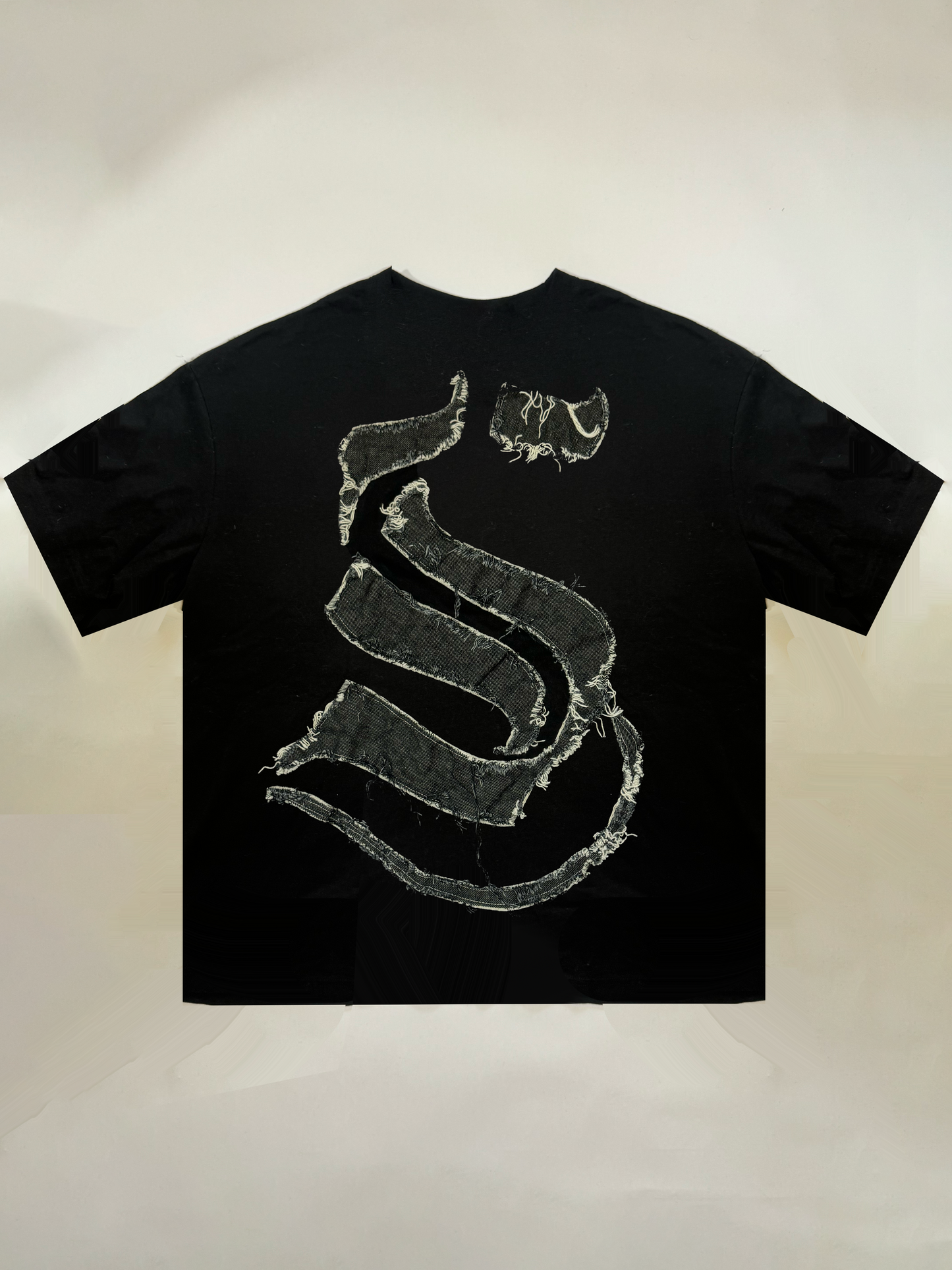 T-shirt con logo in denim